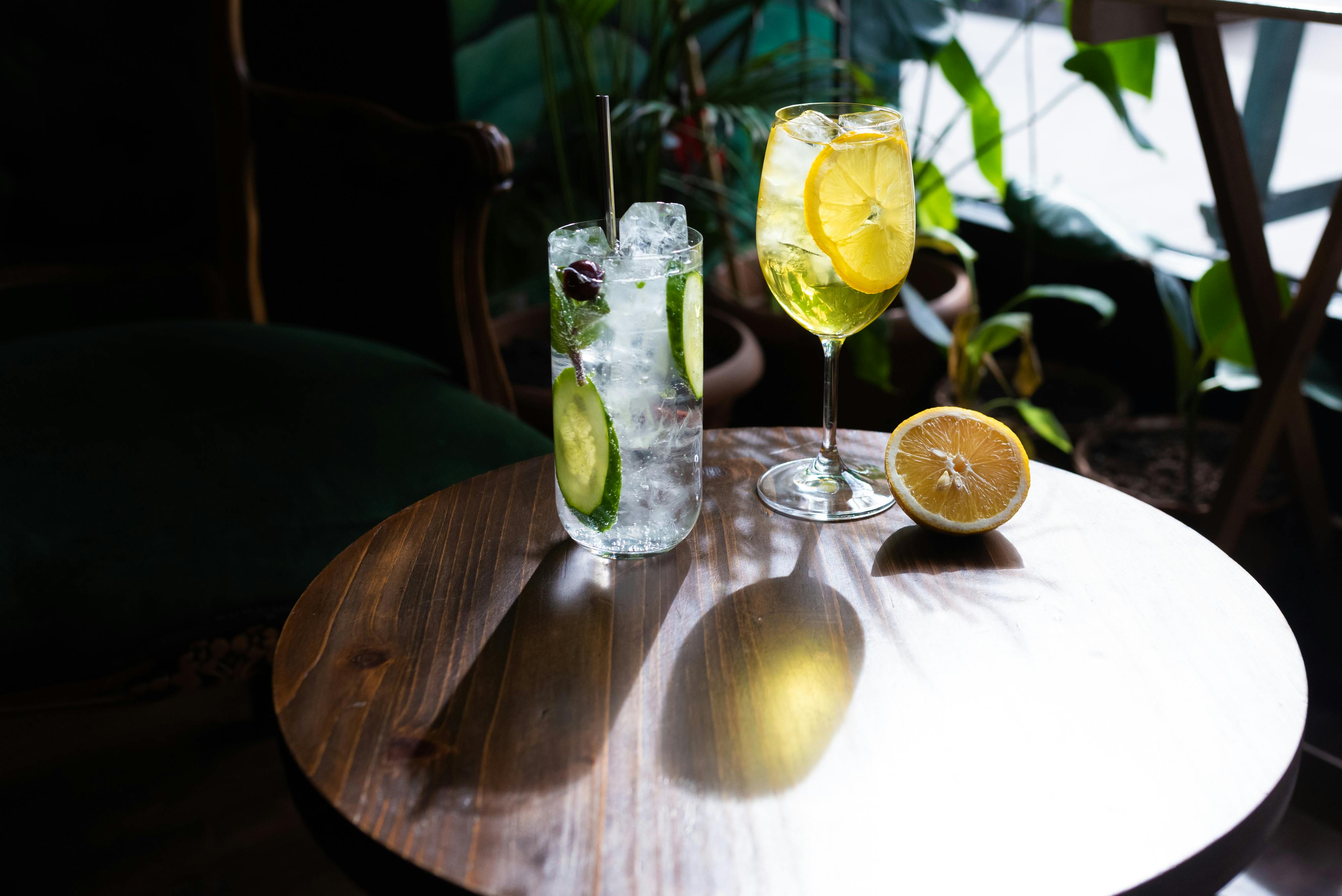 Photo by Arina Krasnikova: https://www.pexels.com/photo/a-cocktail-drinks-on-a-wooden-table-7376798/